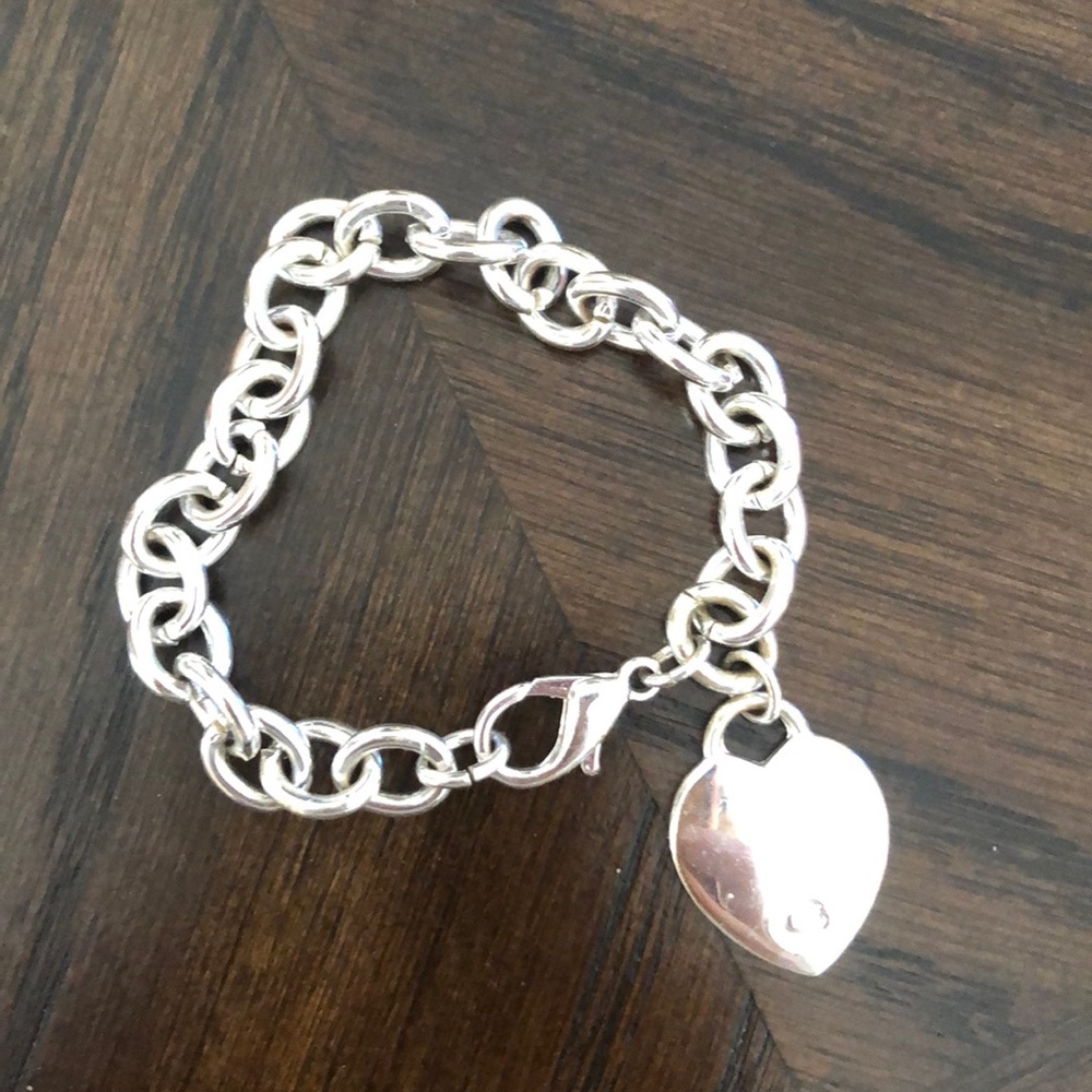 Guess silver plated bracelet with heart